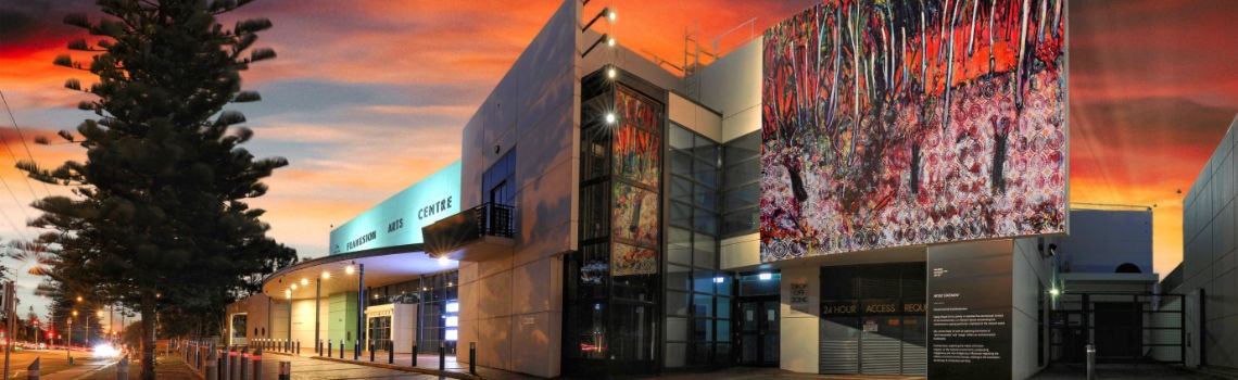 cropped external view of Frankston Arts Centre with red sky