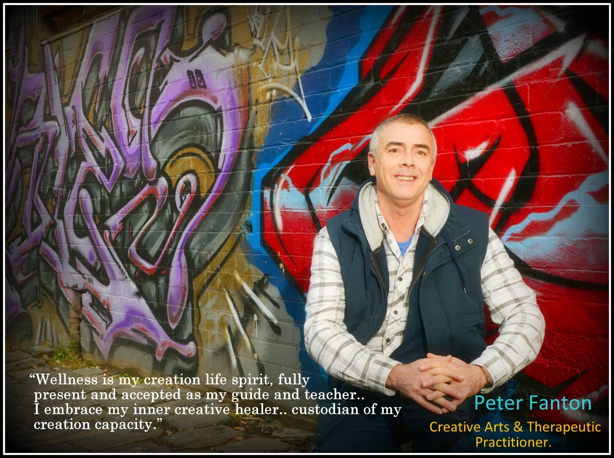 Petr Fanton from Artwell standing in front of a graffiti wall